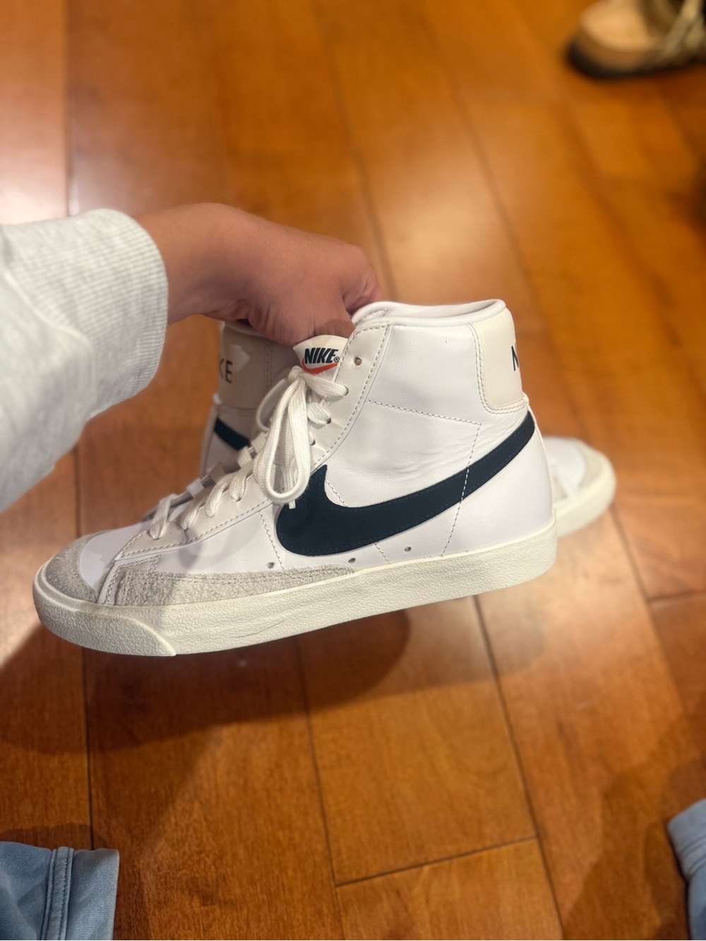 Nike White High-Top Sneakers with Black Swoosh - Picture 8 of 13